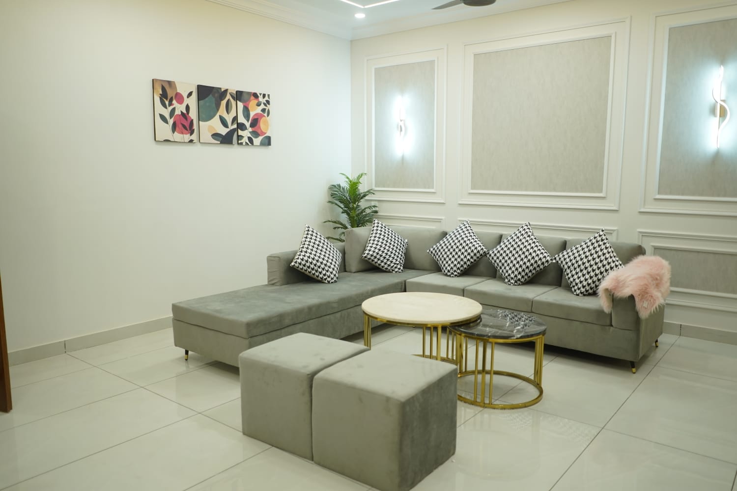 ATALICA living room interior with detailed wall moulding and tailored seating